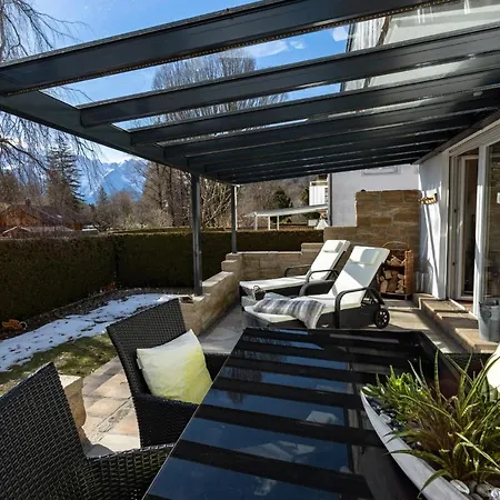 Апартаменты Kaminwohnung Mit 24qm Suedterrasse Naehe Zugspitze / Eibsee Гармиш-Партенкирхен